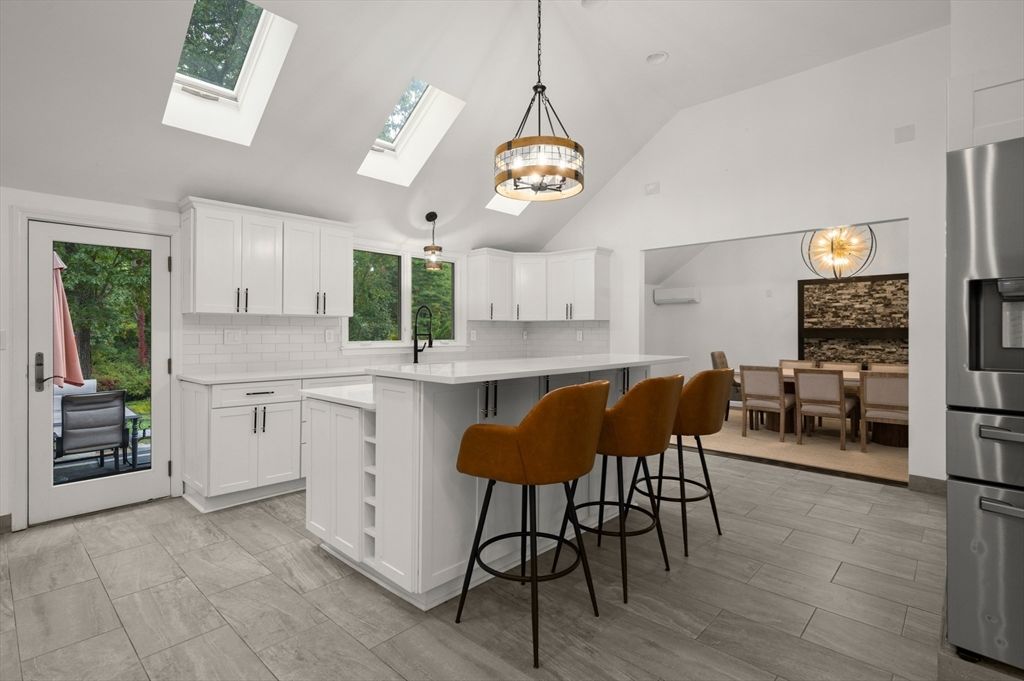 Dining room, Interior, Kitchen, Pendant Lights, Stainless Steel Appliances, Wood Texture Flooring