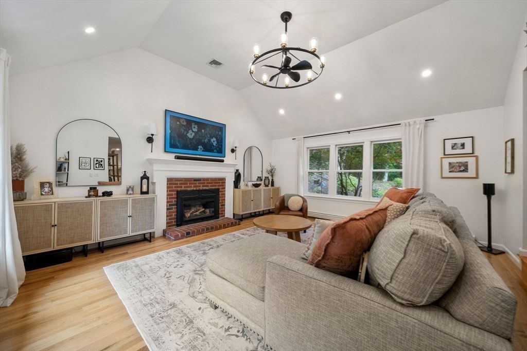 Chandelier, Fireplace, Interior, Living room, Recessed Lighting, Wood Texture Flooring