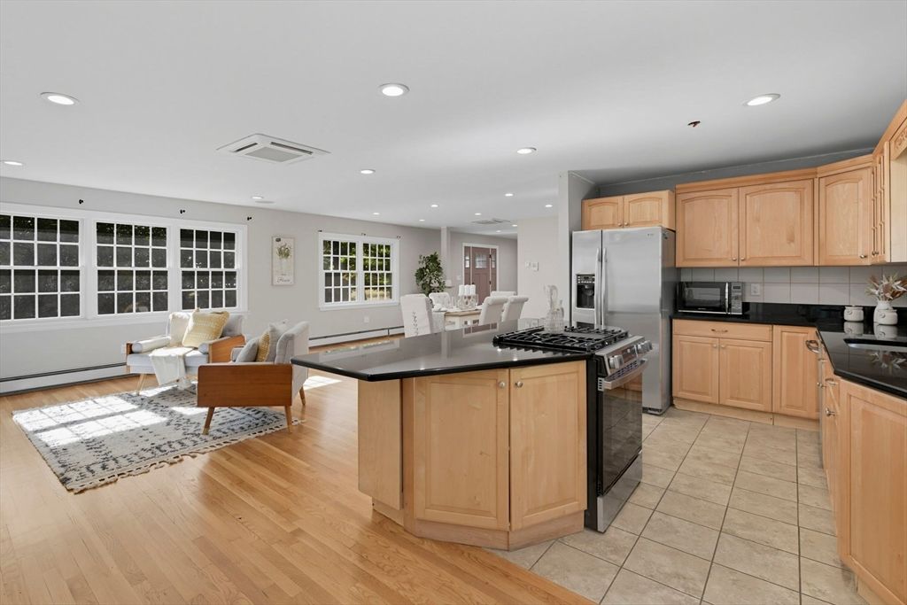 Dining room, Interior, Kitchen, Living room, Recessed Lighting, Stainless Steel Appliances, Wood Texture Flooring