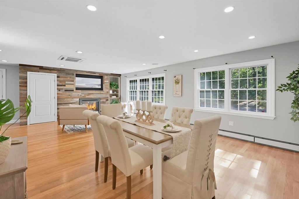 Dining room, Fireplace, Interior, Living room, Recessed Lighting, Wood Texture Flooring, Wooden Walls
