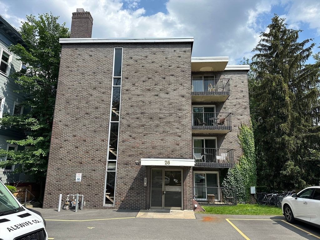 Exterior, Facade, Brick Facade, Condo Building