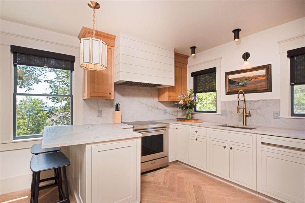 Interior, Kitchen, Marble Walls, Pendant Lights, Stainless Steel Appliances, Wood Texture Flooring