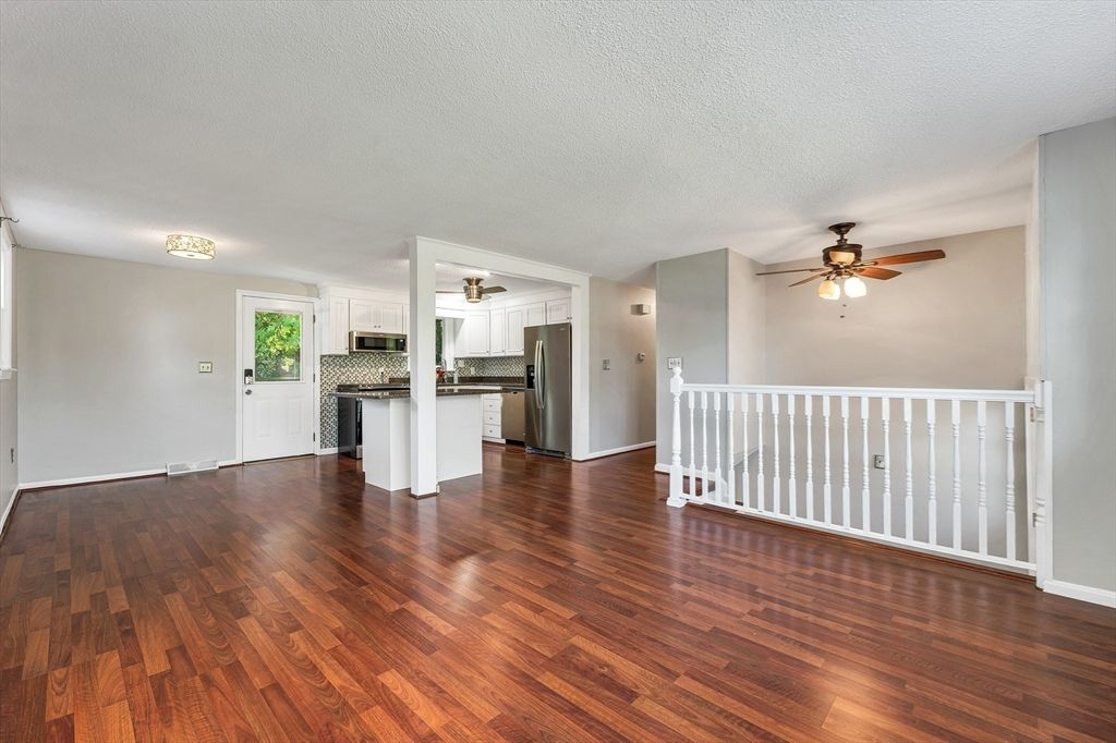 Empty room, Interior, Kitchen, Stainless Steel Appliances, Wood Texture Flooring