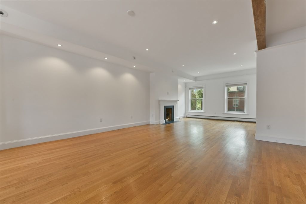 Empty room, Fireplace, Interior, Recessed Lighting, Wood Texture Flooring