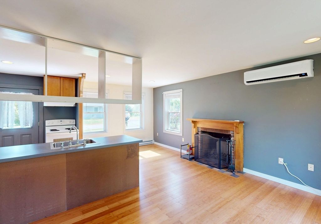 Fireplace, Interior, Kitchen, Recessed Lighting, Wood Texture Flooring