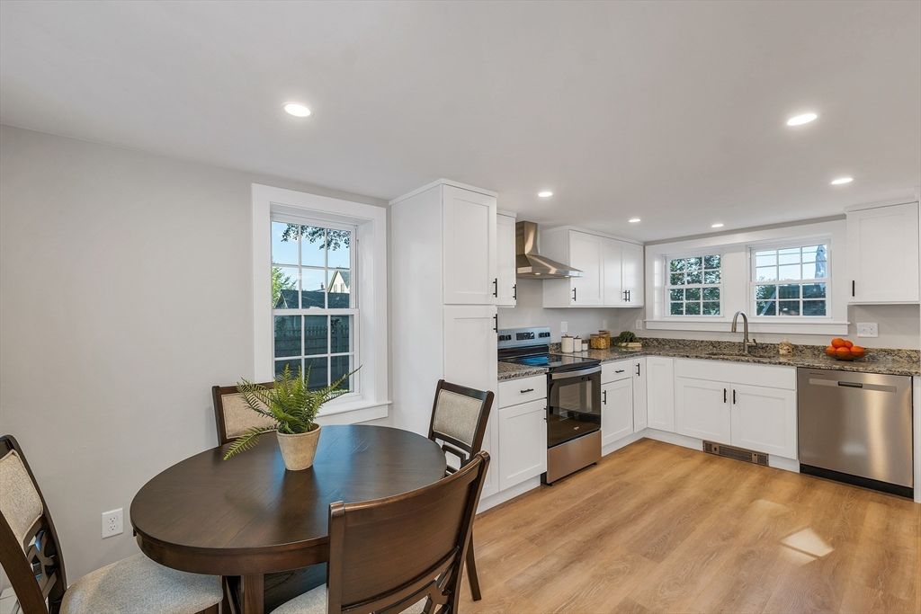 Dining room, Interior, Kitchen, Recessed Lighting, Stainless Steel Appliances, Wood Texture Flooring