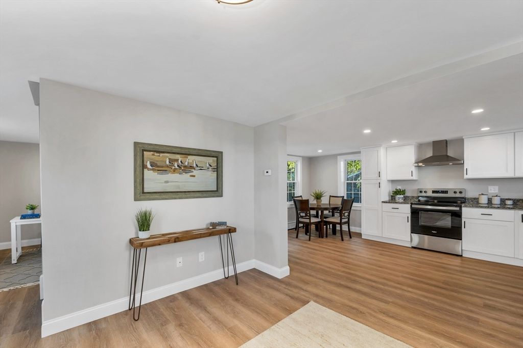 Dining room, Interior, Kitchen, Recessed Lighting, Stainless Steel Appliances, Wood Texture Flooring