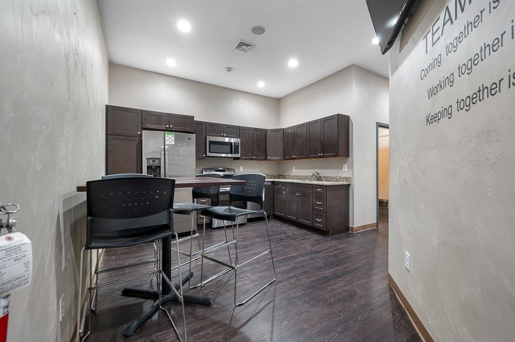 Dining room, Interior, Kitchen, Recessed Lighting, Stainless Steel Appliances, Wood Texture Flooring