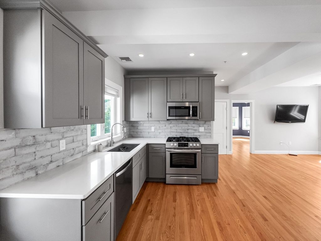 Interior, Kitchen, Recessed Lighting, Stainless Steel Appliances, Wood Texture Flooring