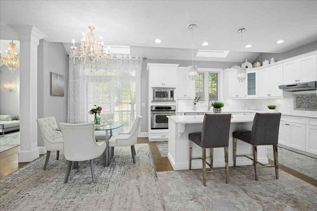 Chandelier, Dining room, Interior, Kitchen, Pendant Lights, Recessed Lighting, Stainless Steel Appliances, Wood Texture Flooring