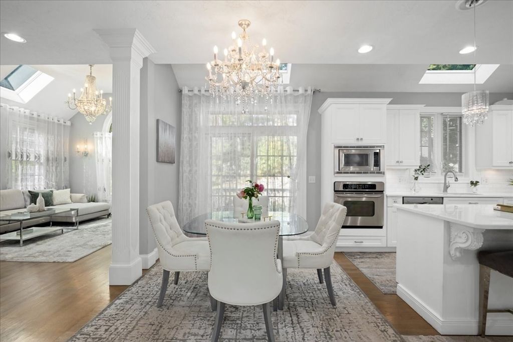 Chandelier, Dining room, Interior, Kitchen, Living room, Pendant Lights, Recessed Lighting, Stainless Steel Appliances, Wood Texture Flooring