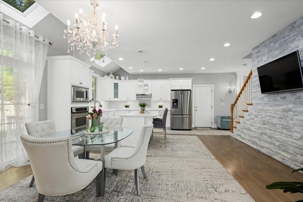 Chandelier, Dining room, Interior, Kitchen, Pendant Lights, Recessed Lighting, Stainless Steel Appliances, Wood Texture Flooring