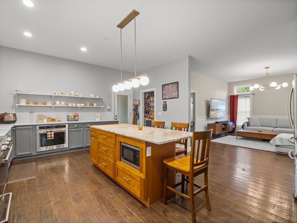 Dining room, Interior, Kitchen, Living room, Pendant Lights, Recessed Lighting, Stainless Steel Appliances, Wood Texture Flooring