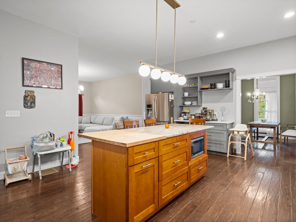 Dining room, Interior, Kitchen, Living room, Pendant Lights, Recessed Lighting, Stainless Steel Appliances, Wood Texture Flooring