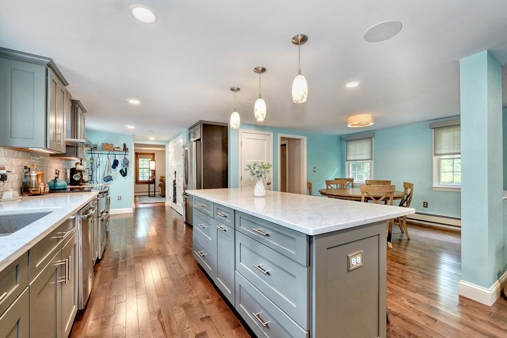Dining room, Interior, Kitchen, Pendant Lights, Recessed Lighting, Stainless Steel Appliances, Wood Texture Flooring