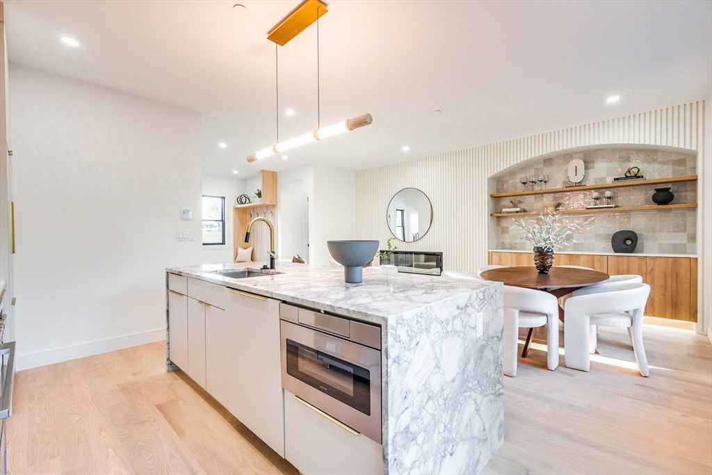 Dining room, Interior, Kitchen, Pendant Lights, Recessed Lighting, Stainless Steel Appliances, Wood Texture Flooring