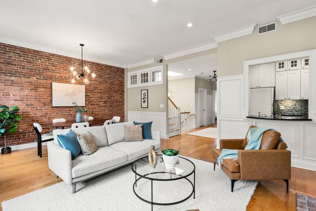 Chandelier, Dining room, Interior, Kitchen, Living room, Pendant Lights, Recessed Lighting, Stone Walls, Wood Texture Flooring