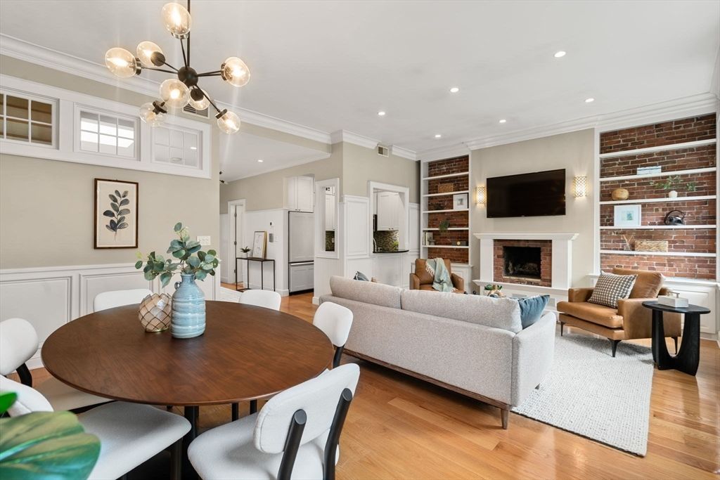Dining room, Fireplace, Interior, Living room, Pendant Lights, Recessed Lighting, Wood Texture Flooring, Wooden Walls