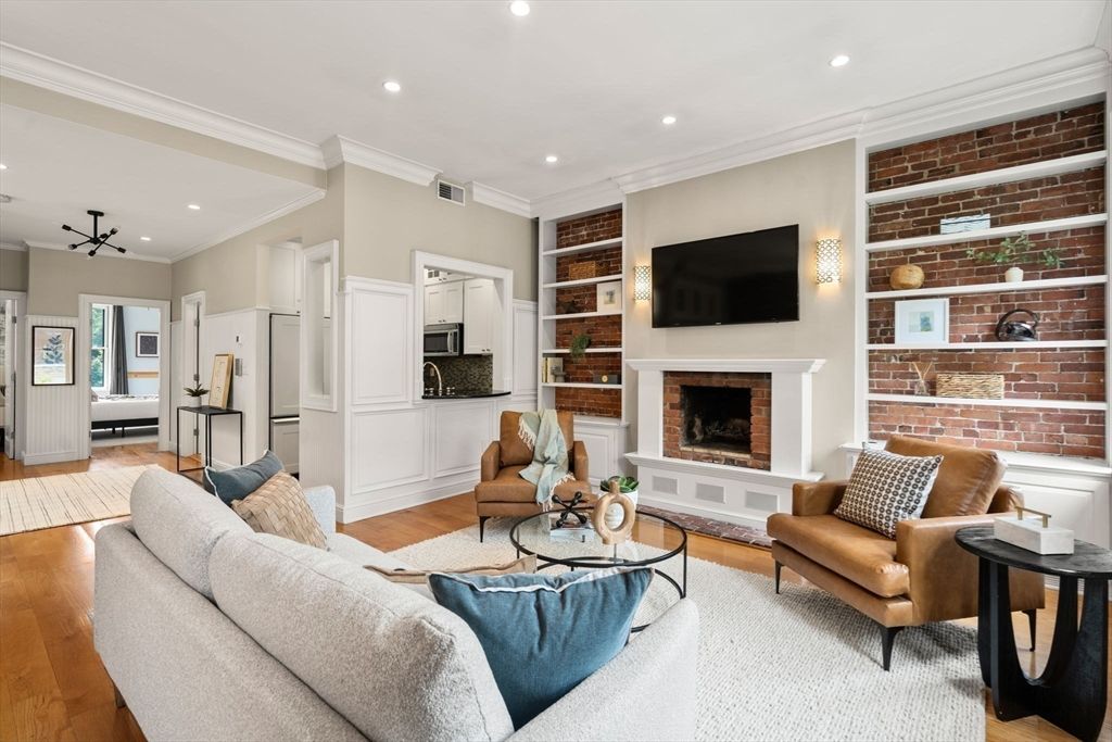 Fireplace, Interior, Living room, Recessed Lighting, Stone Walls, Wood Texture Flooring