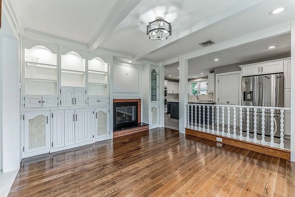Fireplace, Interior, Kitchen, Recessed Lighting, Stainless Steel Appliances, Wood Texture Flooring