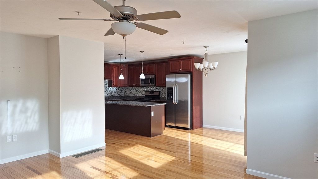 Chandelier, Interior, Kitchen, Pendant Lights, Stainless Steel Appliances, Wood Texture Flooring