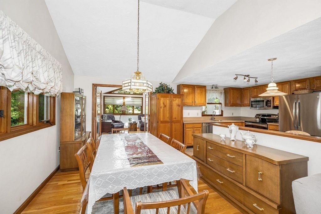 Dining room, Interior, Kitchen, Pendant Lights, Stainless Steel Appliances, Wood Texture Flooring