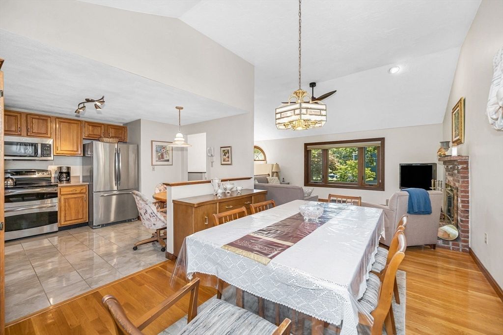 Dining room, Interior, Kitchen, Pendant Lights, Recessed Lighting, Stainless Steel Appliances, Wood Texture Flooring