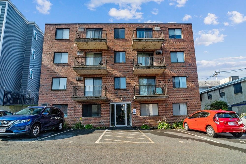 Exterior, Facade, Brick Facade, Condo Building