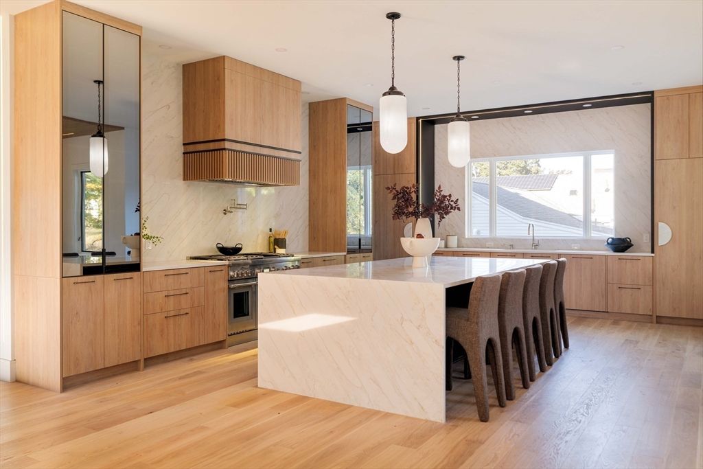 Interior, Kitchen, Marble Walls, Pendant Lights, Recessed Lighting, Stainless Steel Appliances, Wood Texture Flooring