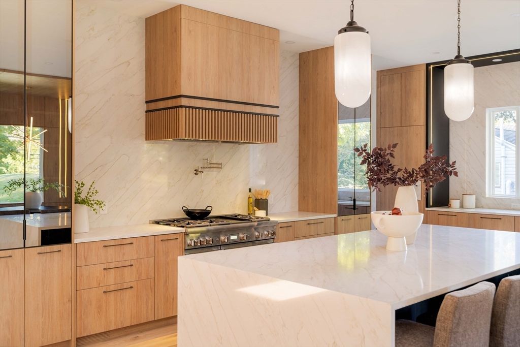 Interior, Kitchen, Marble Walls, Pendant Lights, Stainless Steel Appliances, Wood Texture Flooring