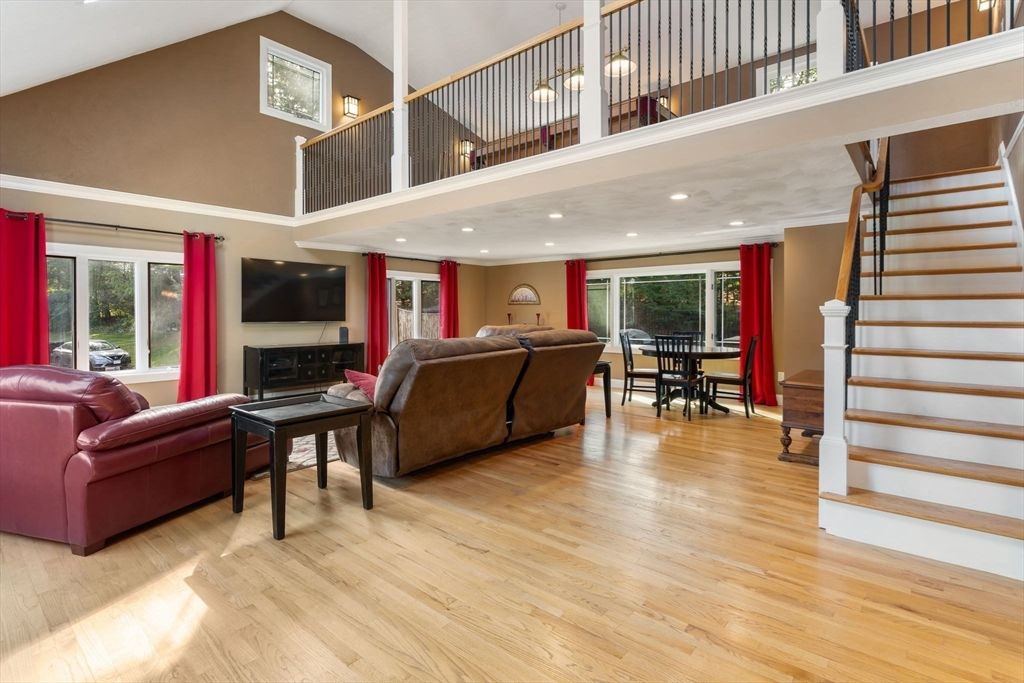 Dining room, Fireplace, Interior, Living room, Pendant Lights, Recessed Lighting, Wood Texture Flooring