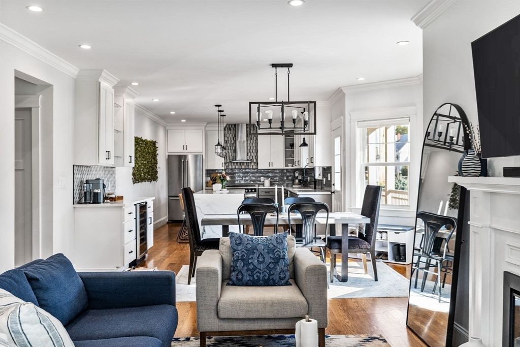 Dining room, Fireplace, Interior, Kitchen, Living room, Pendant Lights, Recessed Lighting, Stainless Steel Appliances, Wood Texture Flooring