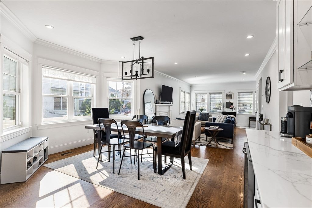 Dining room, Fireplace, Interior, Living room, Pendant Lights, Recessed Lighting, Wood Texture Flooring