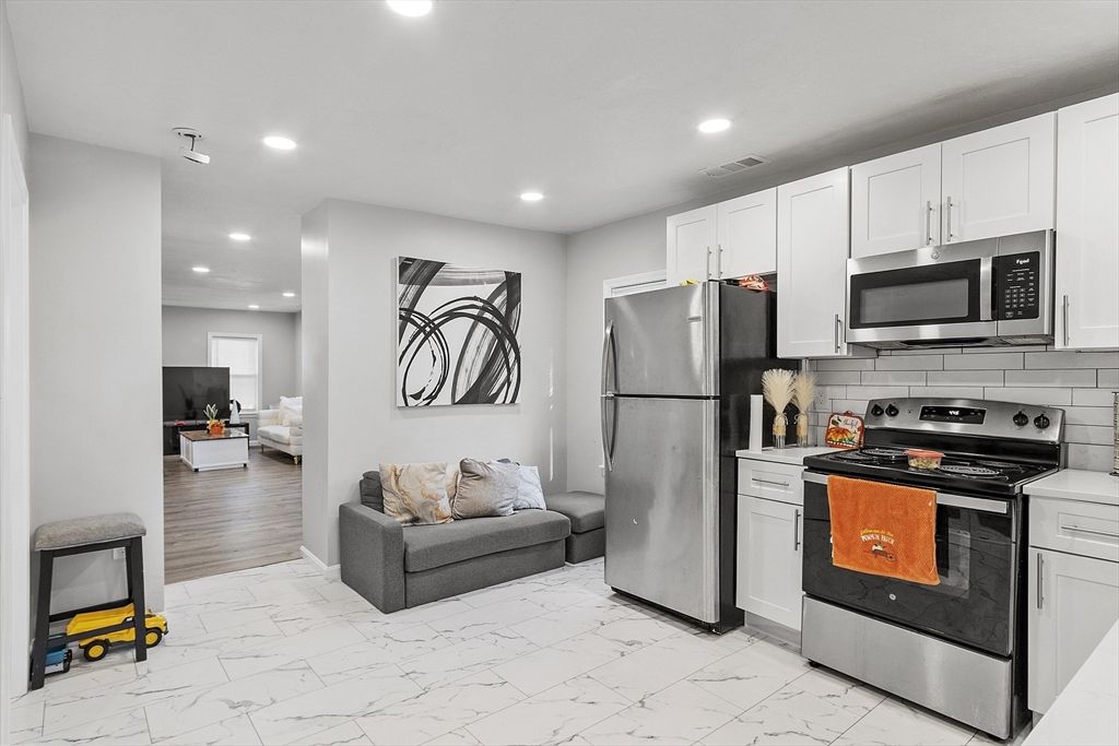 Interior, Kitchen, Living room, Marble, Recessed Lighting, Stainless Steel Appliances, Wood Texture Flooring