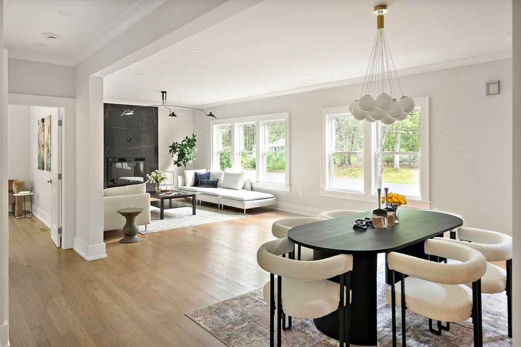 Dining room, Fireplace, Interior, Living room, Pendant Lights, Recessed Lighting, Wood Texture Flooring