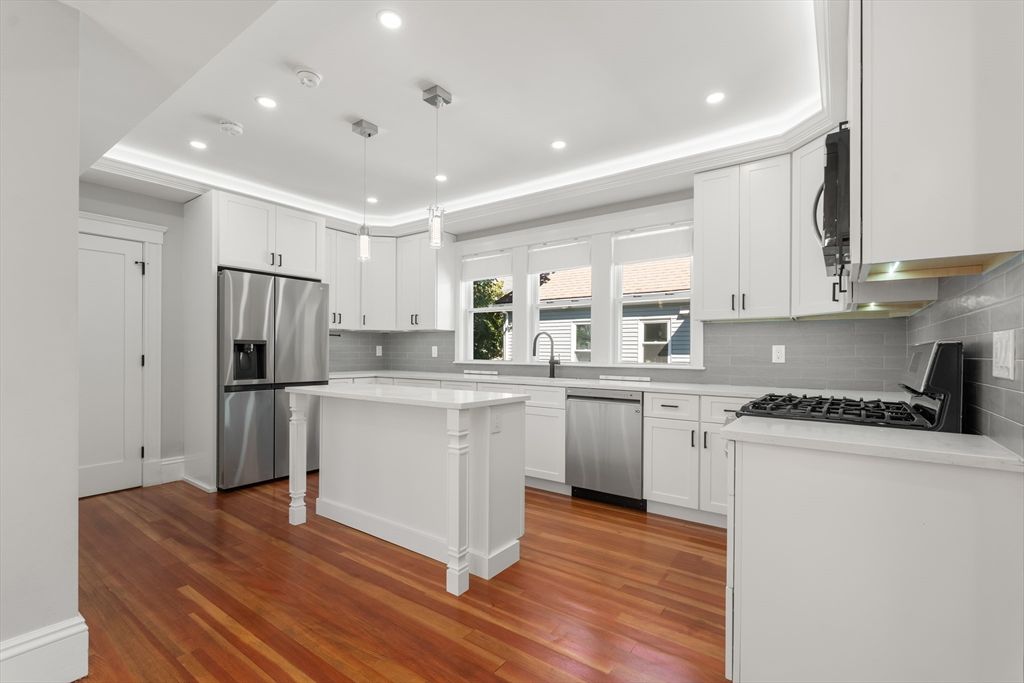 Interior, Kitchen, Pendant Lights, Recessed Lighting, Stainless Steel Appliances, Wood Texture Flooring