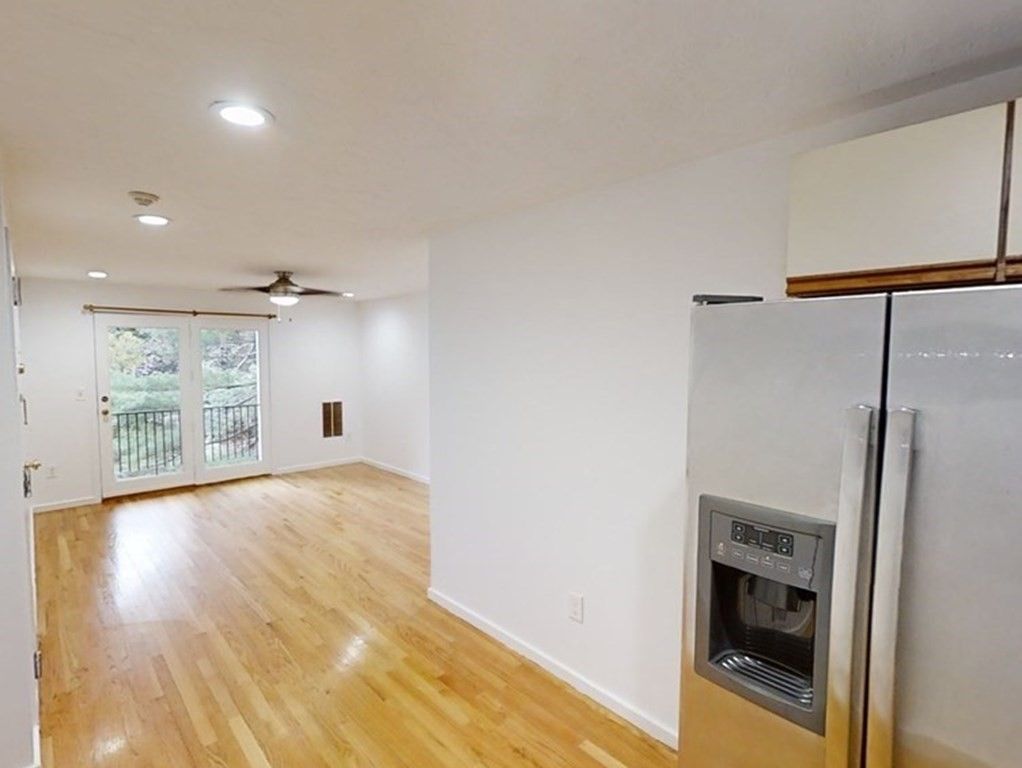Empty room, Fireplace, Interior, Kitchen, Recessed Lighting, Wood Texture Flooring
