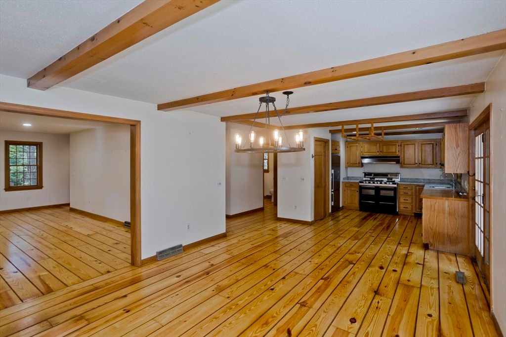 Chandelier, Empty room, Interior, Kitchen, Pendant Lights, Stainless Steel Appliances, Wooden Beams, Wood Texture Flooring