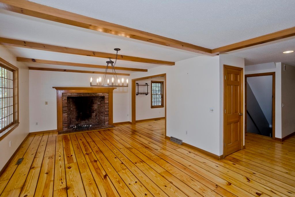 Empty room, Fireplace, Interior, Pendant Lights, Recessed Lighting, Wooden Beams, Wood Texture Flooring