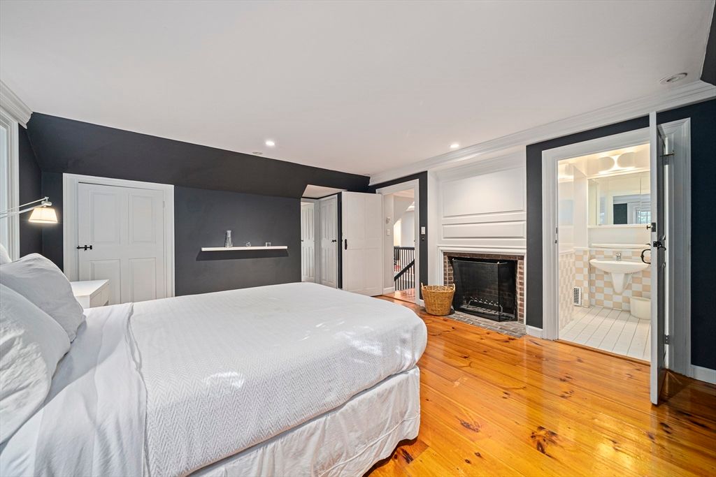 Bedroom, Fireplace, Interior, Recessed Lighting, Wood Texture Flooring