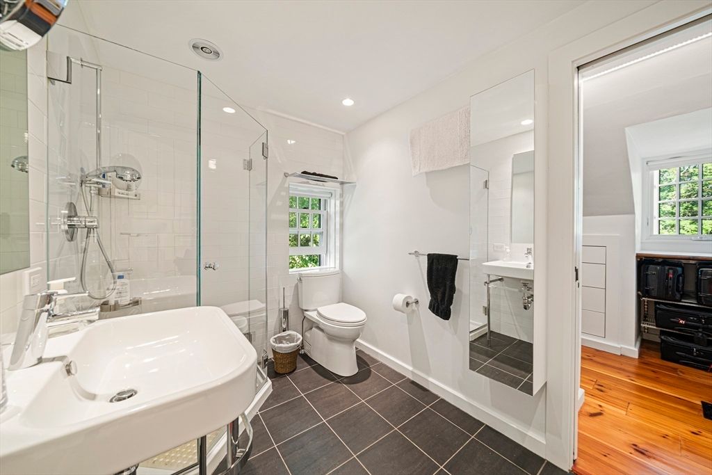 Bathroom, Dual Sink Vanities, Glass Shower, Interior, Recessed Lighting, Wood Texture Flooring