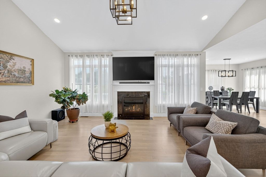Dining room, Fireplace, Interior, Living room, Pendant Lights, Recessed Lighting, Wood Texture Flooring