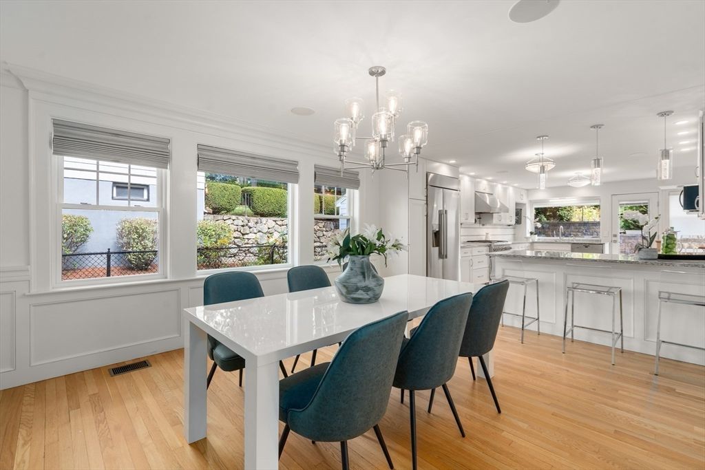 Chandelier, Dining room, Interior, Kitchen, Pendant Lights, Stainless Steel Appliances, Wood Texture Flooring