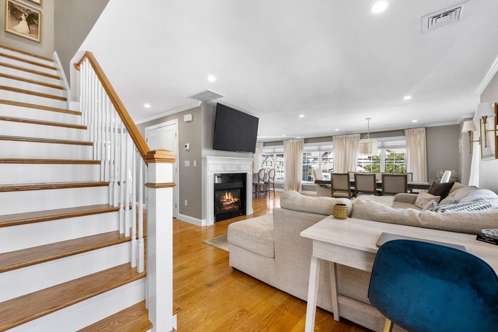 Dining room, Fireplace, Interior, Living room, Pendant Lights, Recessed Lighting, Wood Texture Flooring