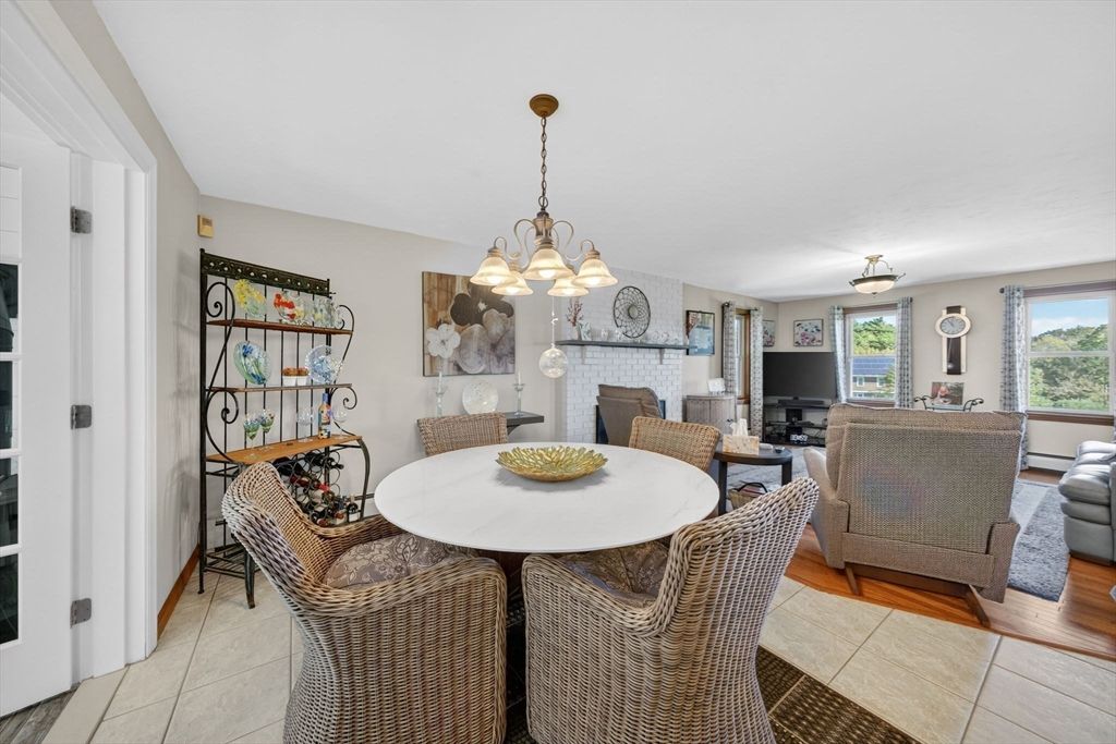 Dining room, Fireplace, Interior, Living room, Pendant Lights, Wood Texture Flooring