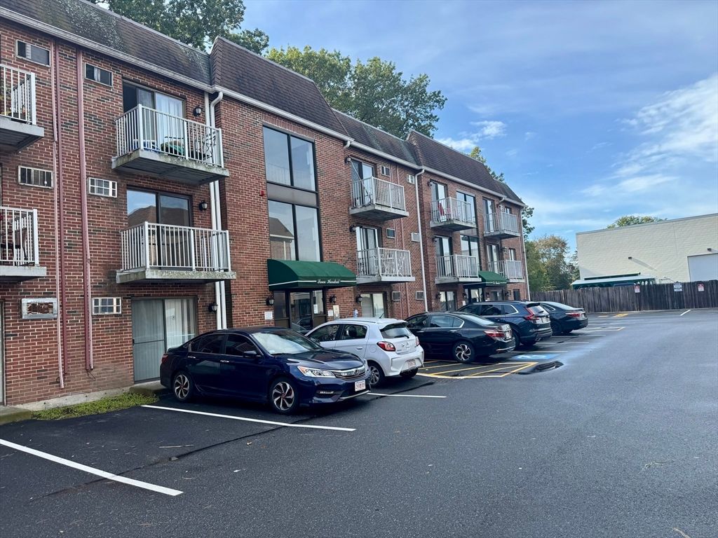 Exterior, Facade, Brick Facade, Condo Building