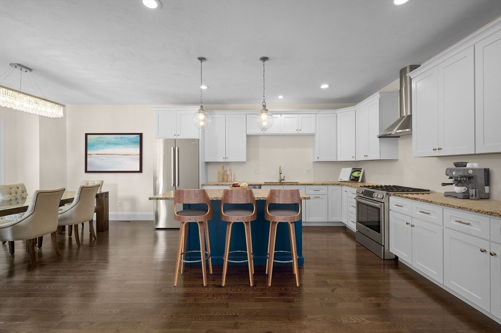 Chandelier, Dining room, Interior, Kitchen, Pendant Lights, Recessed Lighting, Stainless Steel Appliances, Wood Texture Flooring