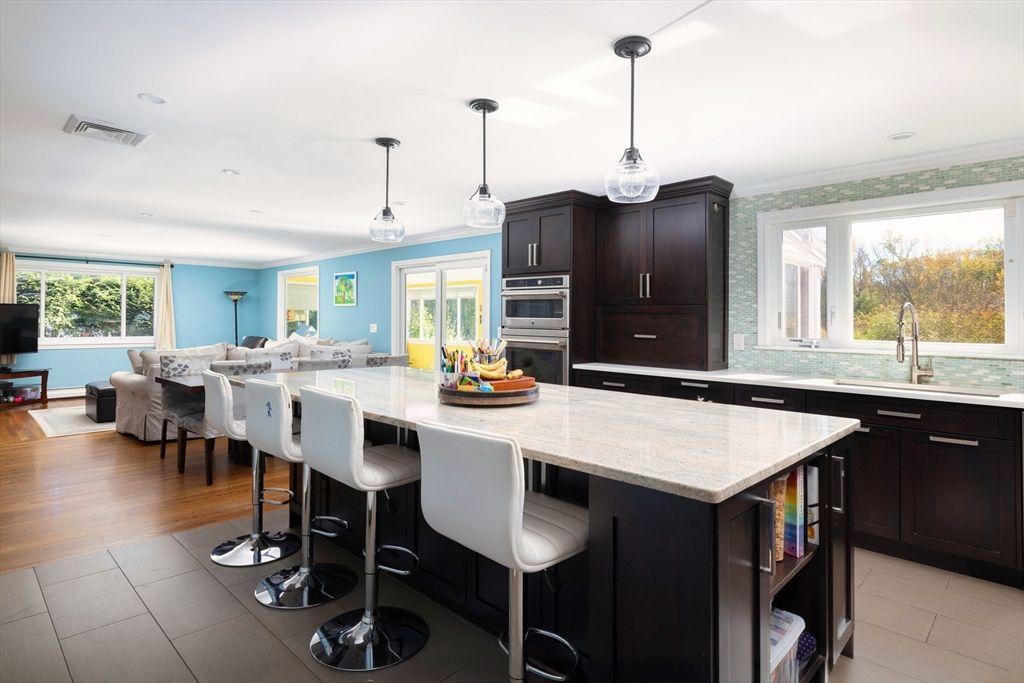 Dining room, Interior, Kitchen, Living room, Pendant Lights, Recessed Lighting, Stainless Steel Appliances, Wood Texture Flooring