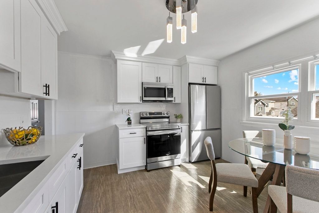 Dining room, Interior, Kitchen, Pendant Lights, Stainless Steel Appliances, Wood Texture Flooring