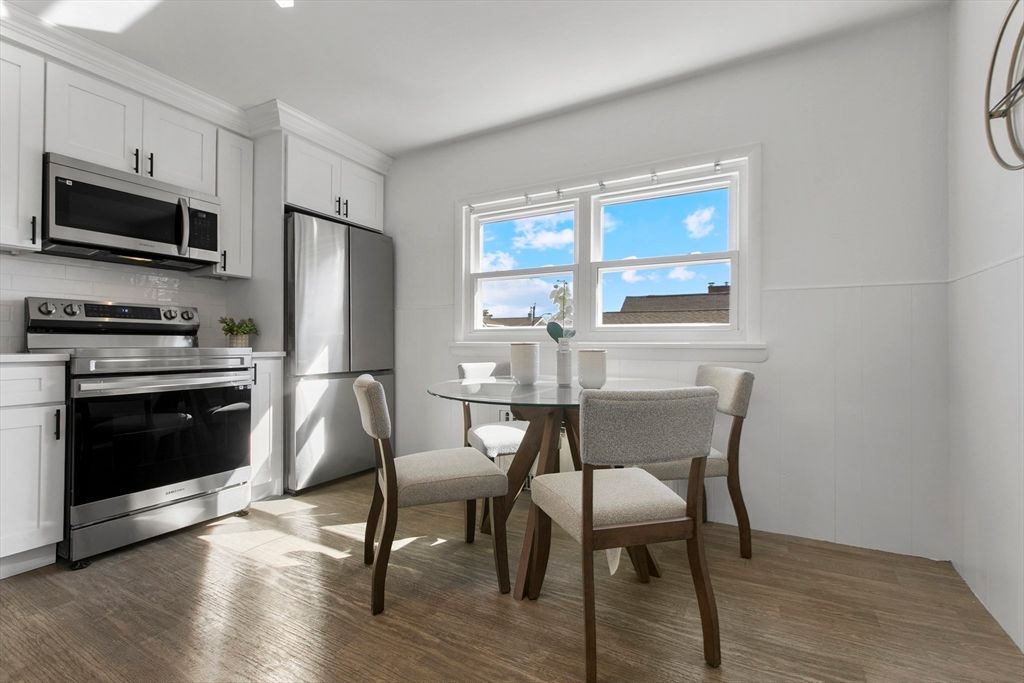 Dining room, Interior, Kitchen, Recessed Lighting, Stainless Steel Appliances, Wood Texture Flooring